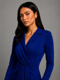 Close-up of the neckline and fit of the blue midi dress